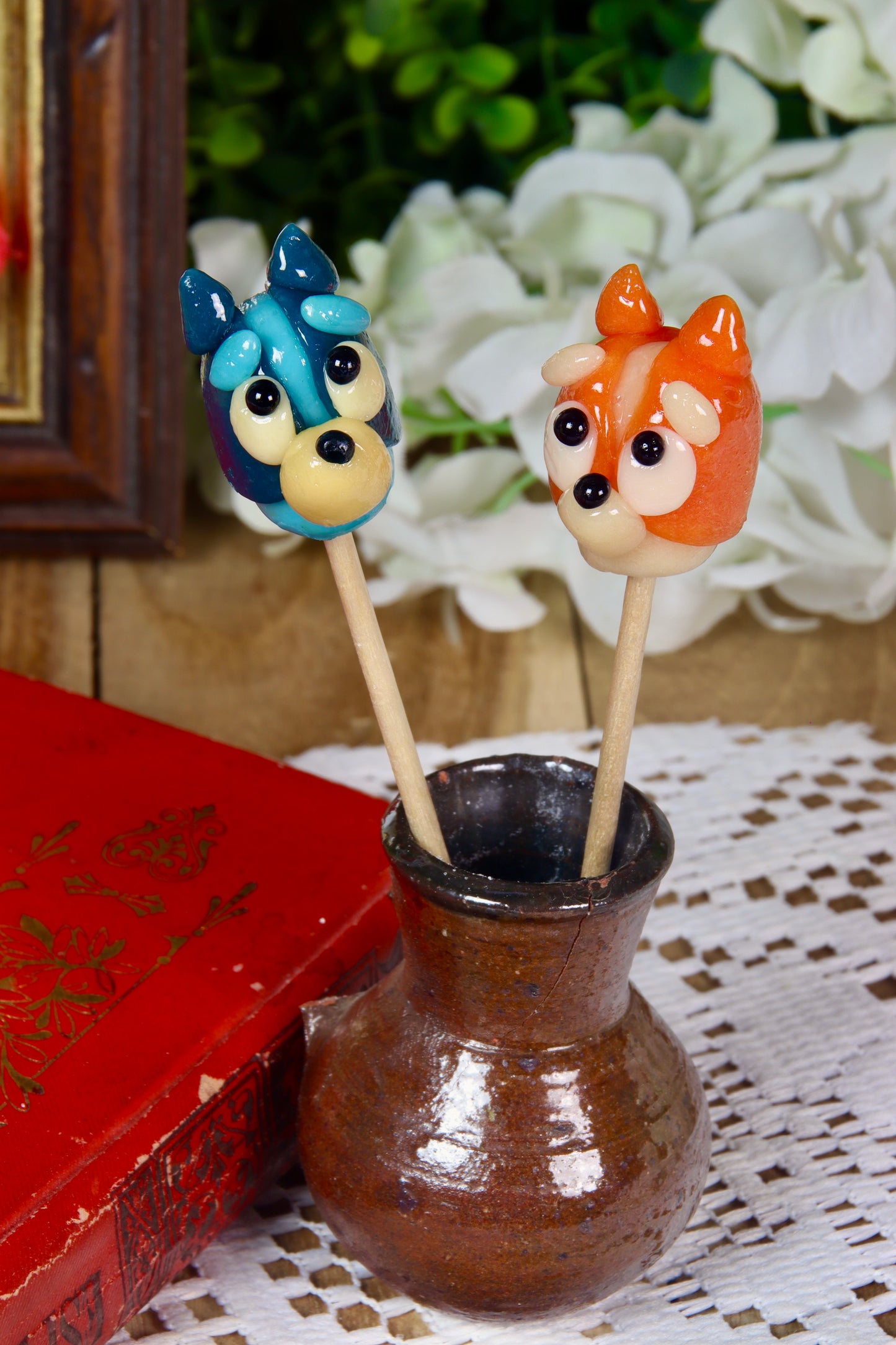 Sucette en forme de Bluey et de Bingo