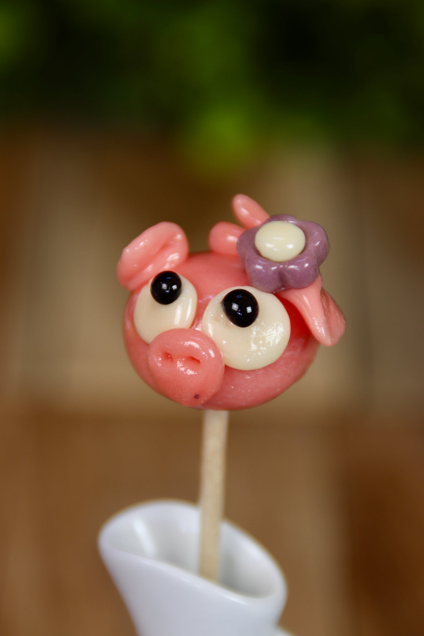 Sucette cochon avec fleur