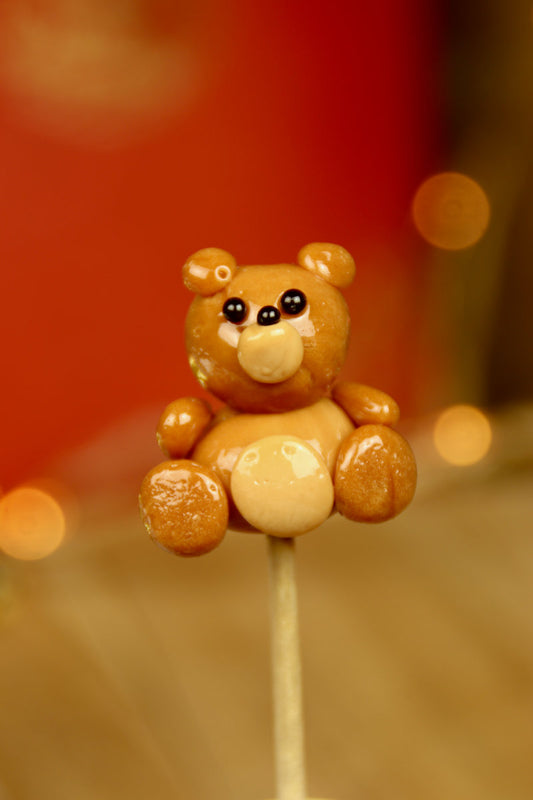 sucette sculptée en forme de peluche au spéculoos