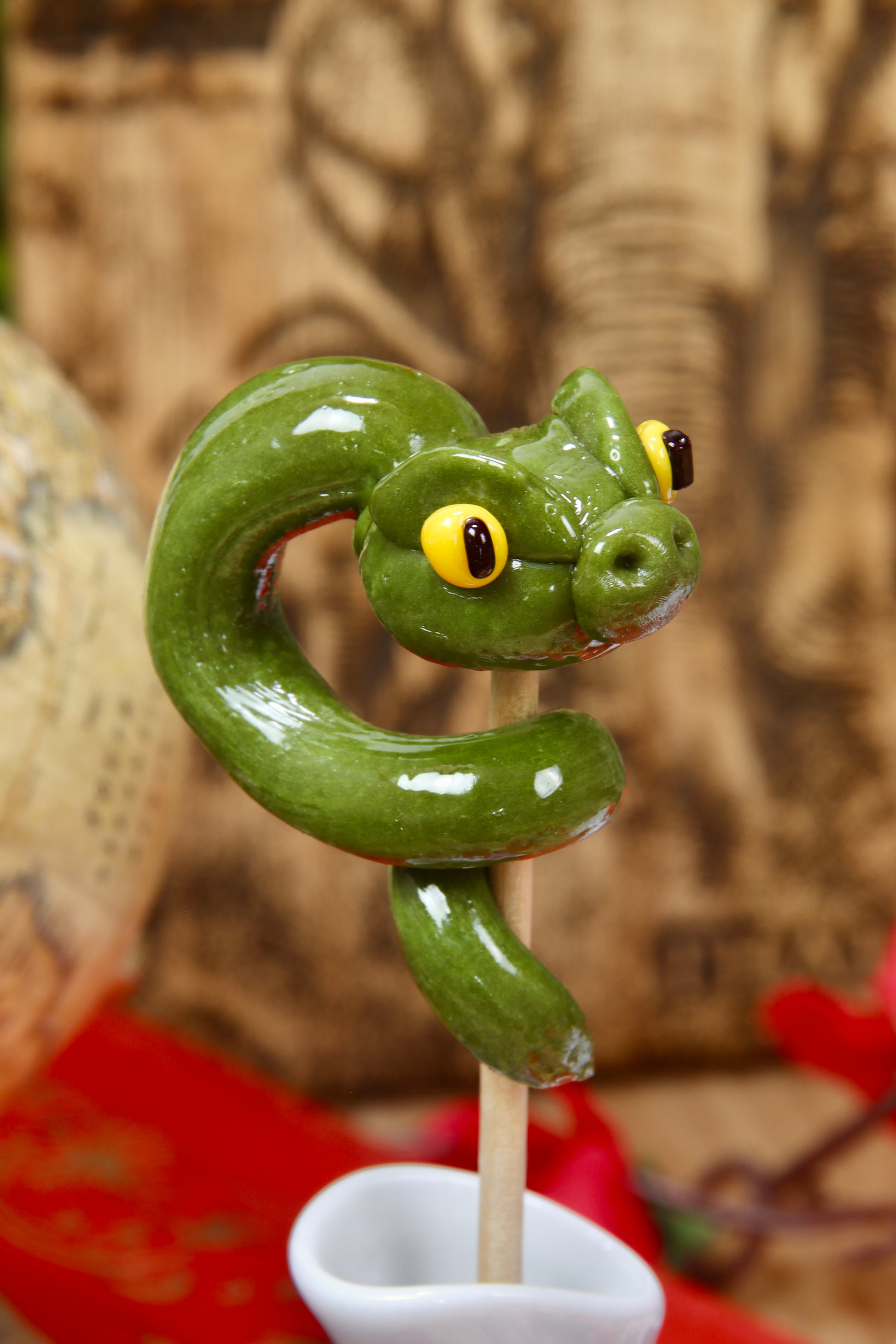 Sucette serpent pomme