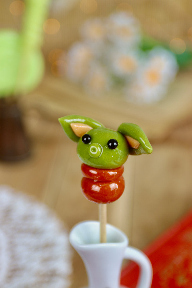 Sucette en forme de yoda pomme caramel