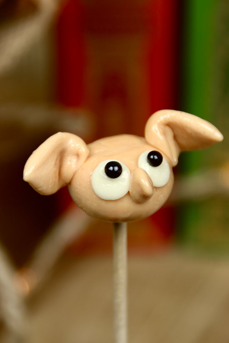 Sucette en forme d'Elfe de maison inspiré de Dobby au caramel beurre salé