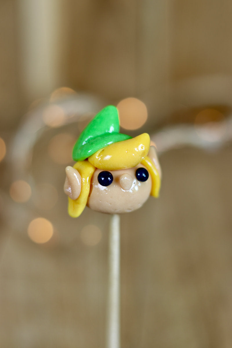 Sucette sculptée en forme de link dans Zelda à l'ananas et à la pomme