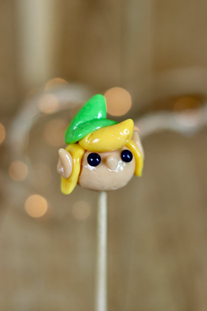 Sucette sculptée en forme de link dans Zelda à l'ananas et à la pomme