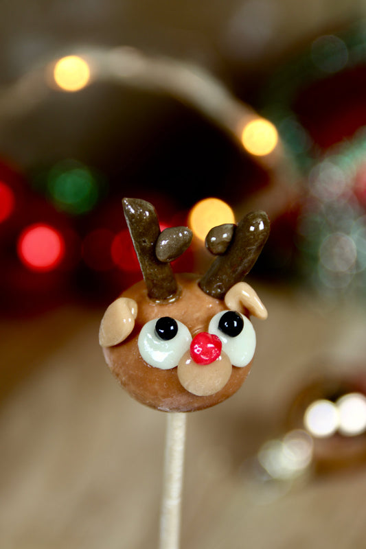 Sucette artisanale en forme de renne au spéculoos