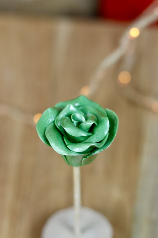 Sucette sculptée en forme de fleur à la pomme