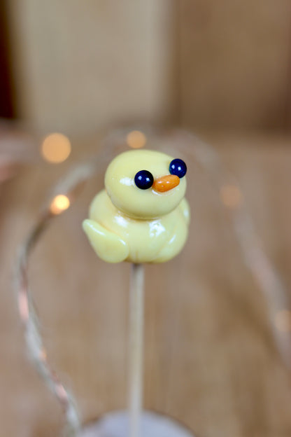 Sucette sculptée en forme de canard à la pêche