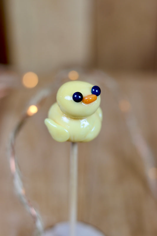 Sucette sculptée en forme de canard à la pêche