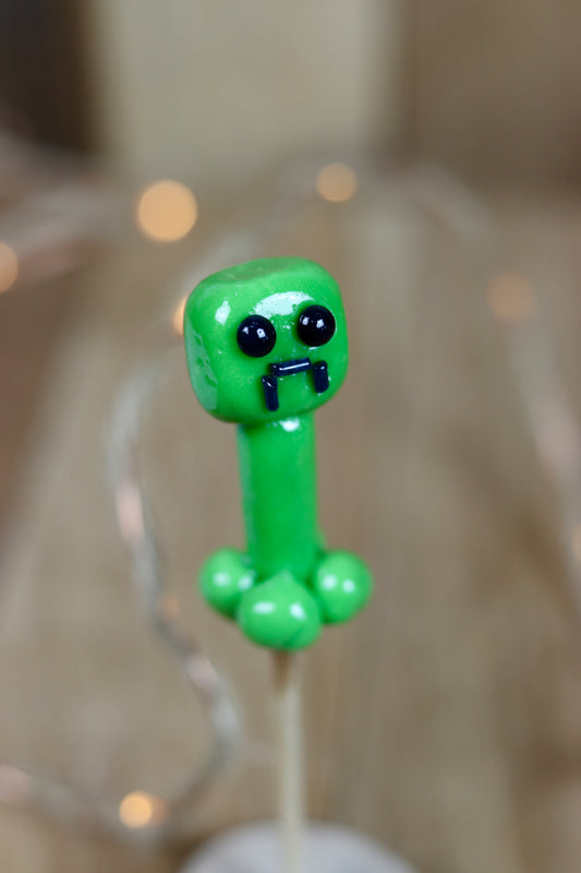 Sucette sculptée en forme de Creeper à la pomme