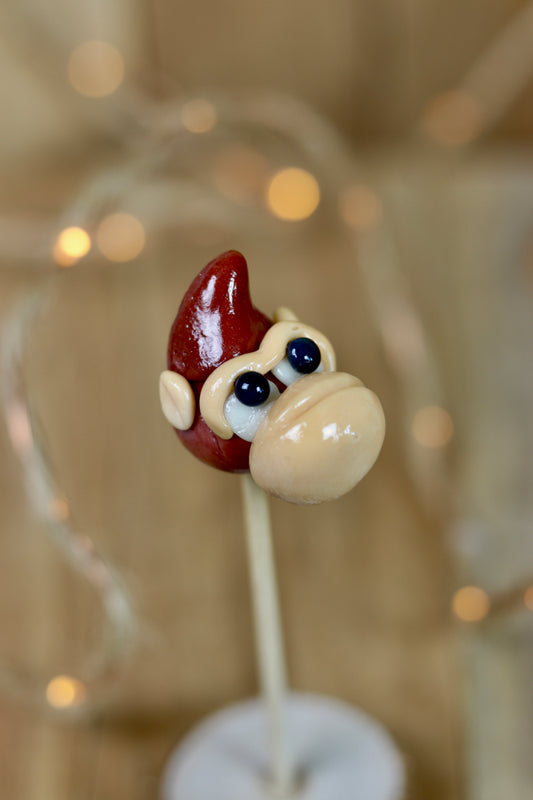 Sucette sculptée en forme de gorille au cacao et caramel, inspiré de Donkey Kong