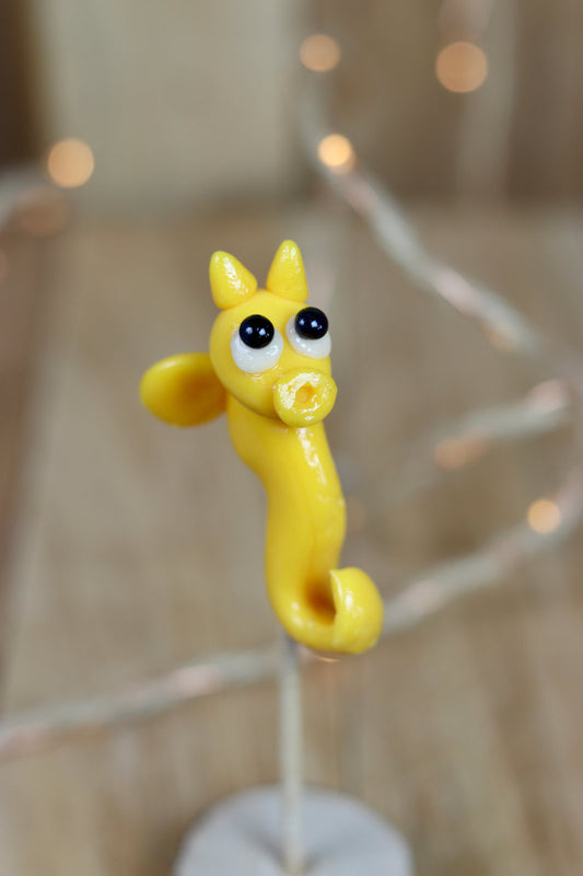 Sucette sculptée en forme d'hippocampe à la pêche