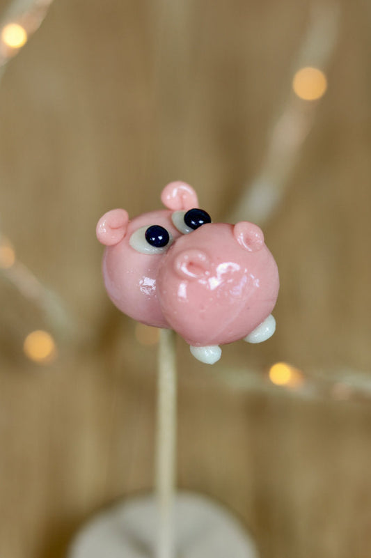 Sucette sculptée en forme d'hippopotame à la framboise