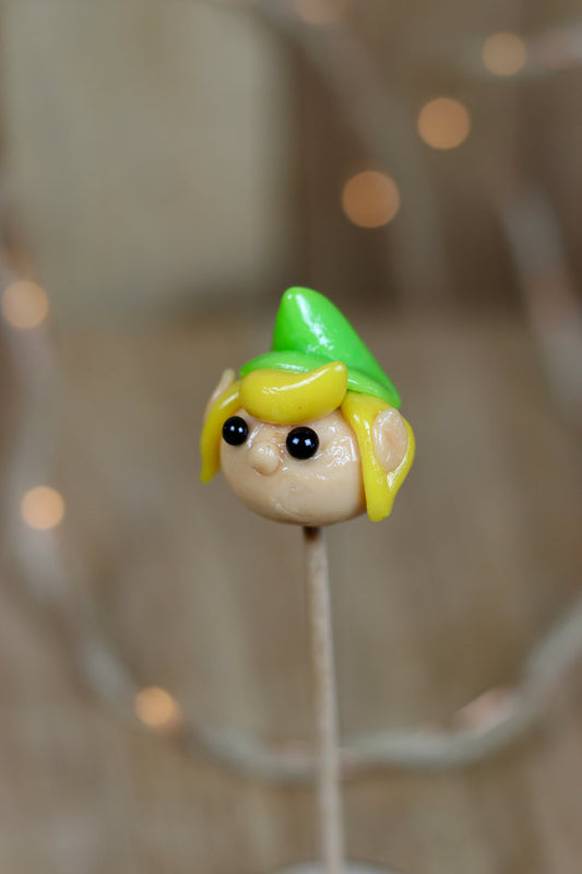 Sucette sculptée en forme de Link dans Zelda. A l'ananas et à la pomme