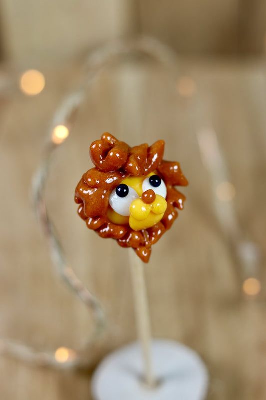 Sucette sculptée en forme de Lion à l'ananas et au caramel