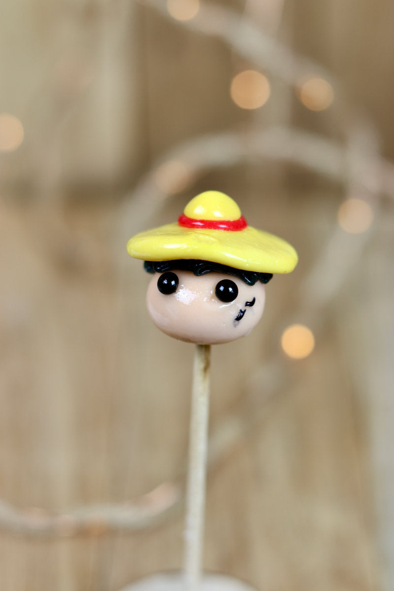 Sucette sculptée en forme du pirate luffy, à la pêche et au cola