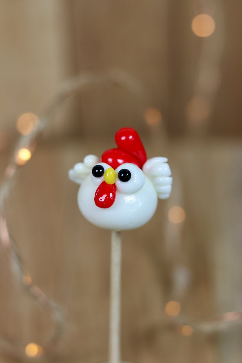 Sucette sculptée en forme de poule au citron et à la framboise