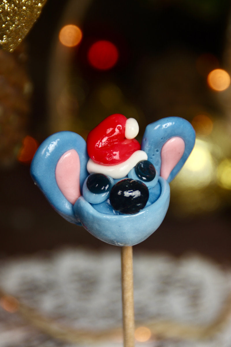 Sucette en forme de stitch avec bonne de noel myrtille fraise