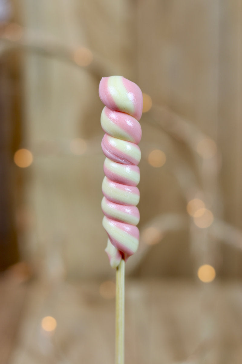 Sucette classique torsade artisanale à la pêche et à la framboise