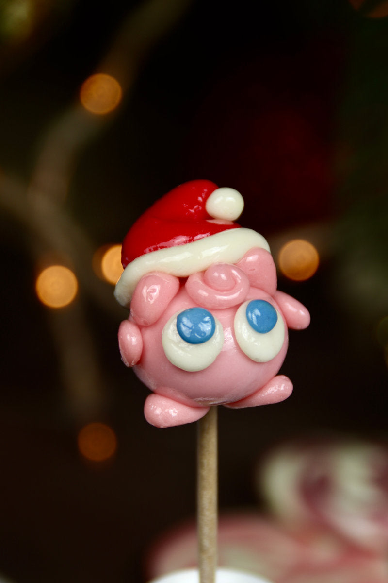 Sucette en forme de roudoudou avec un chapeau de Noel