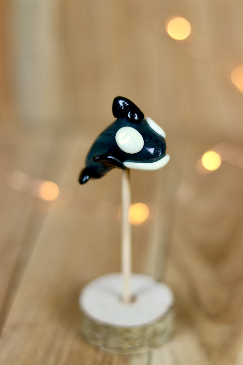 Sucette sculptée en forme d'orque à la vanille et au cola